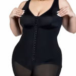Back and thigh shaping of mid thigh tummy control shapewear bodysuit