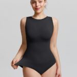 Woman in black seamless crew-neck bodysuit, front view.