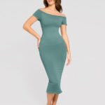 Woman in light green off-shoulder shaper dress, front view.