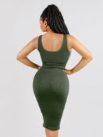 Back view of dark green ribbed midi dress.