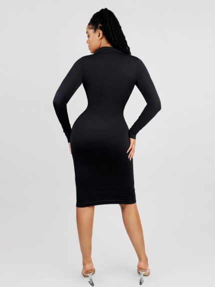 Back view of black long-sleeve ribbed midi dress.