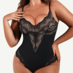 Woman wearing the black lace-front low-back thong bodysuit, front view.