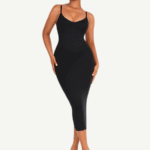 Woman in black seamless V-neck shaper dress, front view.