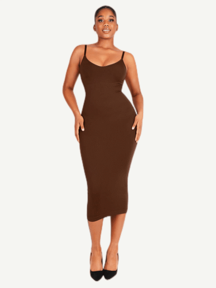 Woman in dark brown spaghetti-strap shaper dress, front view.