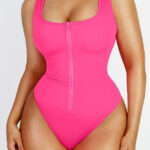Hot pink zip-front shaping swimsuit front view