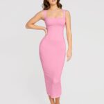 Woman in candy pink square-neck shaper dress, front view.
