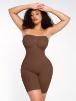 Woman in dark brown strapless shaping bodysuit, front view.