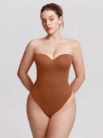 Woman wearing the caramel brown underwire strapless thong bodysuit, front view.